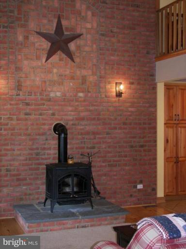 738 Cockeys Mill Road Reisterstown, MD 21136 - Photo 8 of 29 Full exposed brick wall