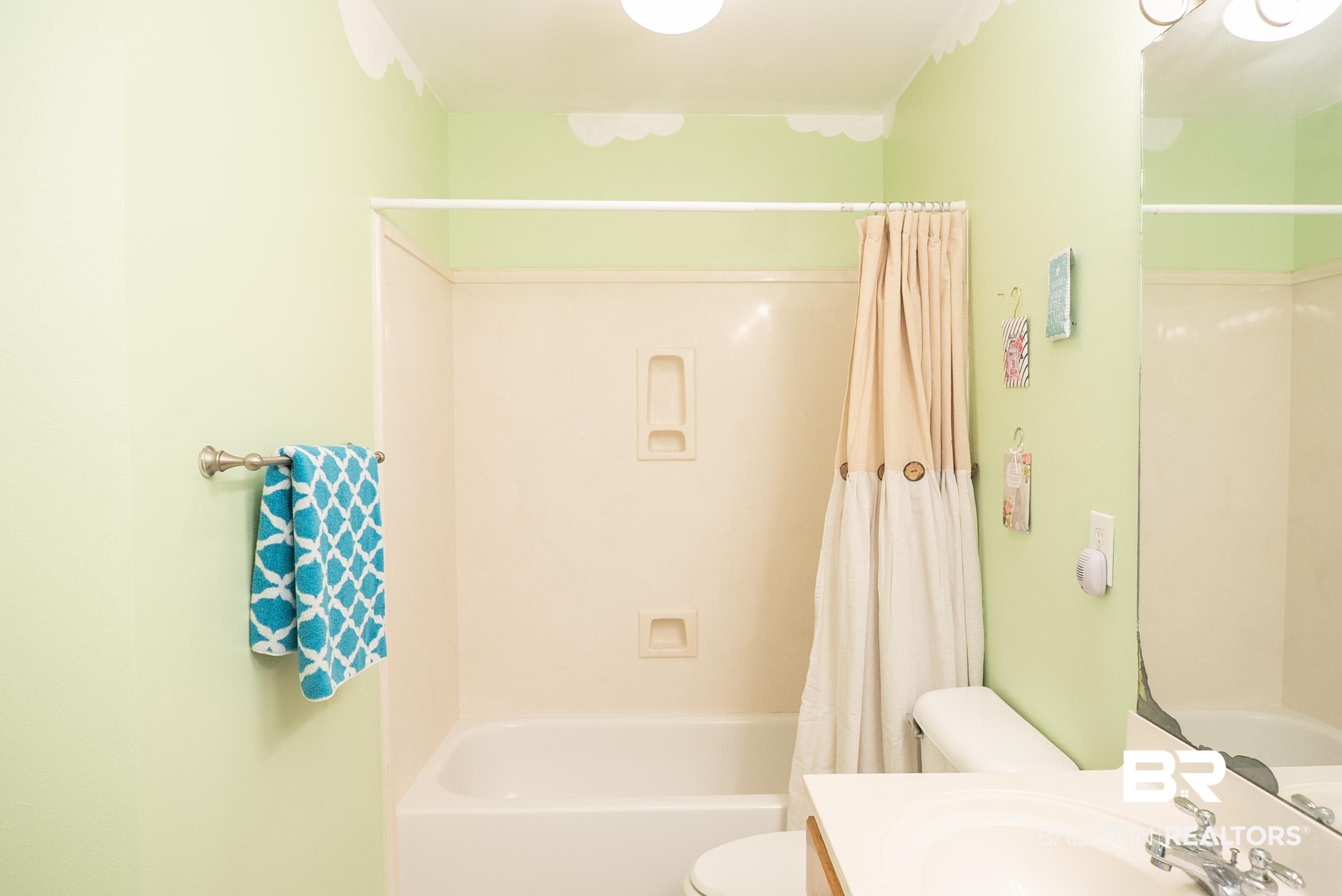 10023 Springfield Court Mobile, AL 36695 - Photo 29 of 50 Full bath featuring shower / bathtub combination with curtain and vanity