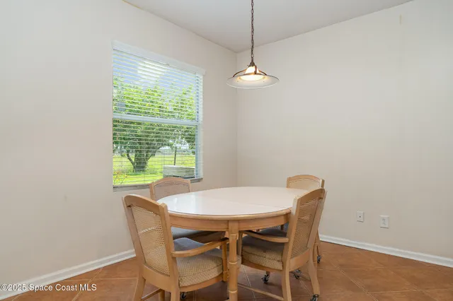 a kitchen with stainless steel appliances a stove microwave and refrigerator