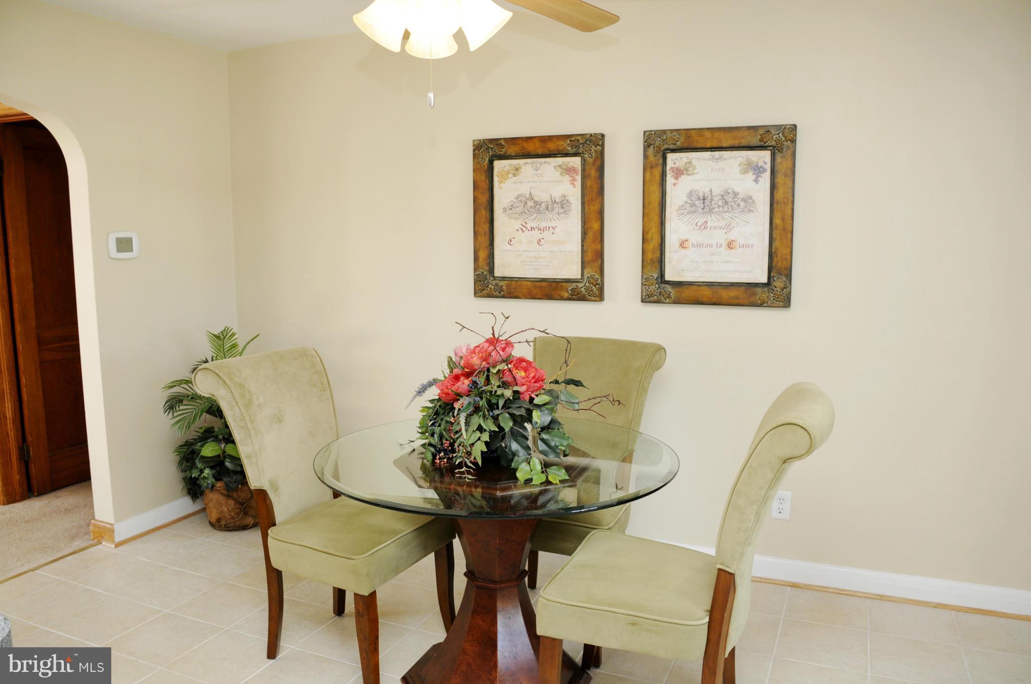 606 Cleveland Road Linthicum Heights, MD 21090 - Photo 2 of 24 a dining room with furniture and window
