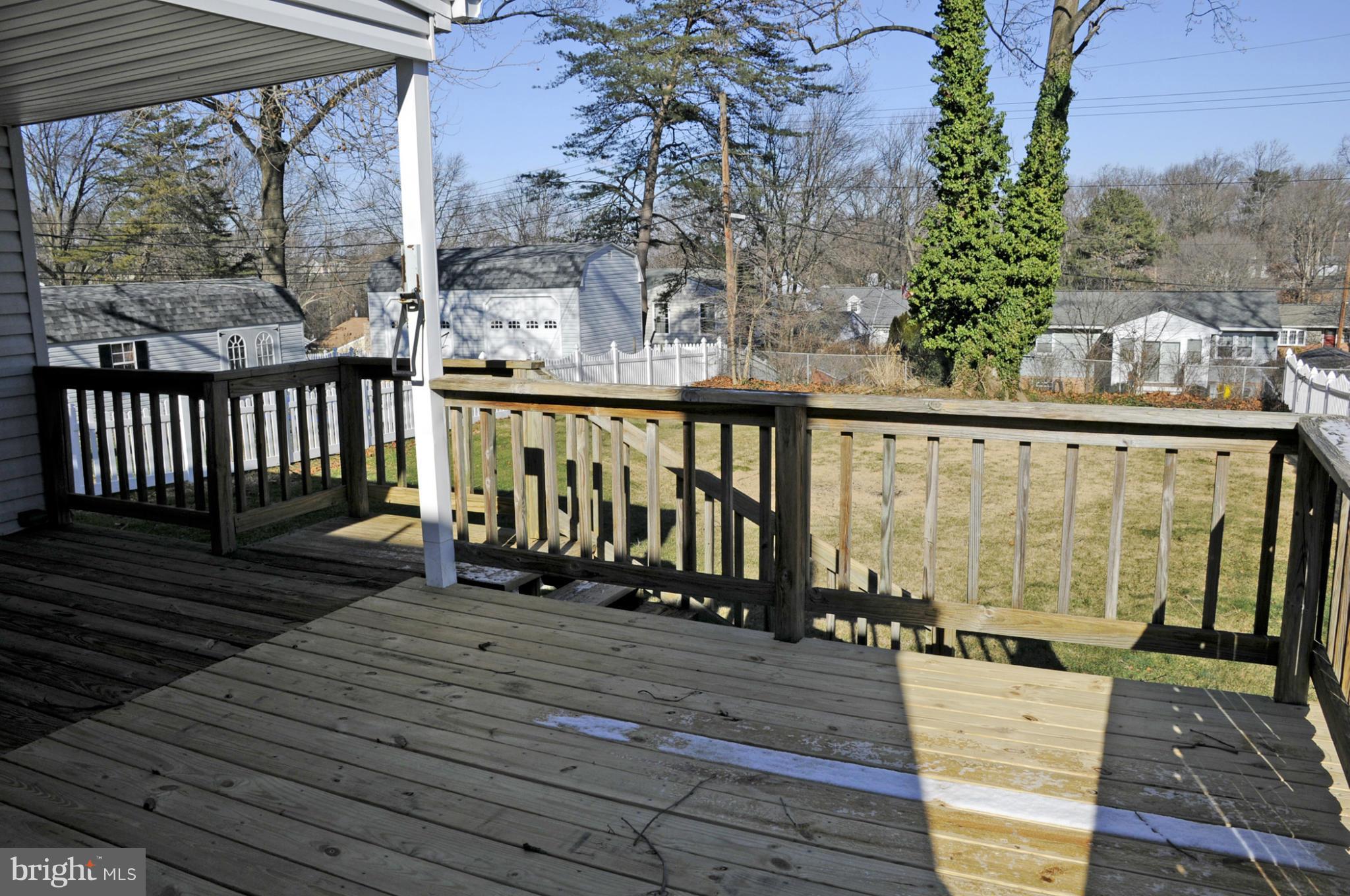 606 Cleveland Road Linthicum Heights, MD 21090 - Photo 24 of 24 a view of balcony with wooden floor and fence