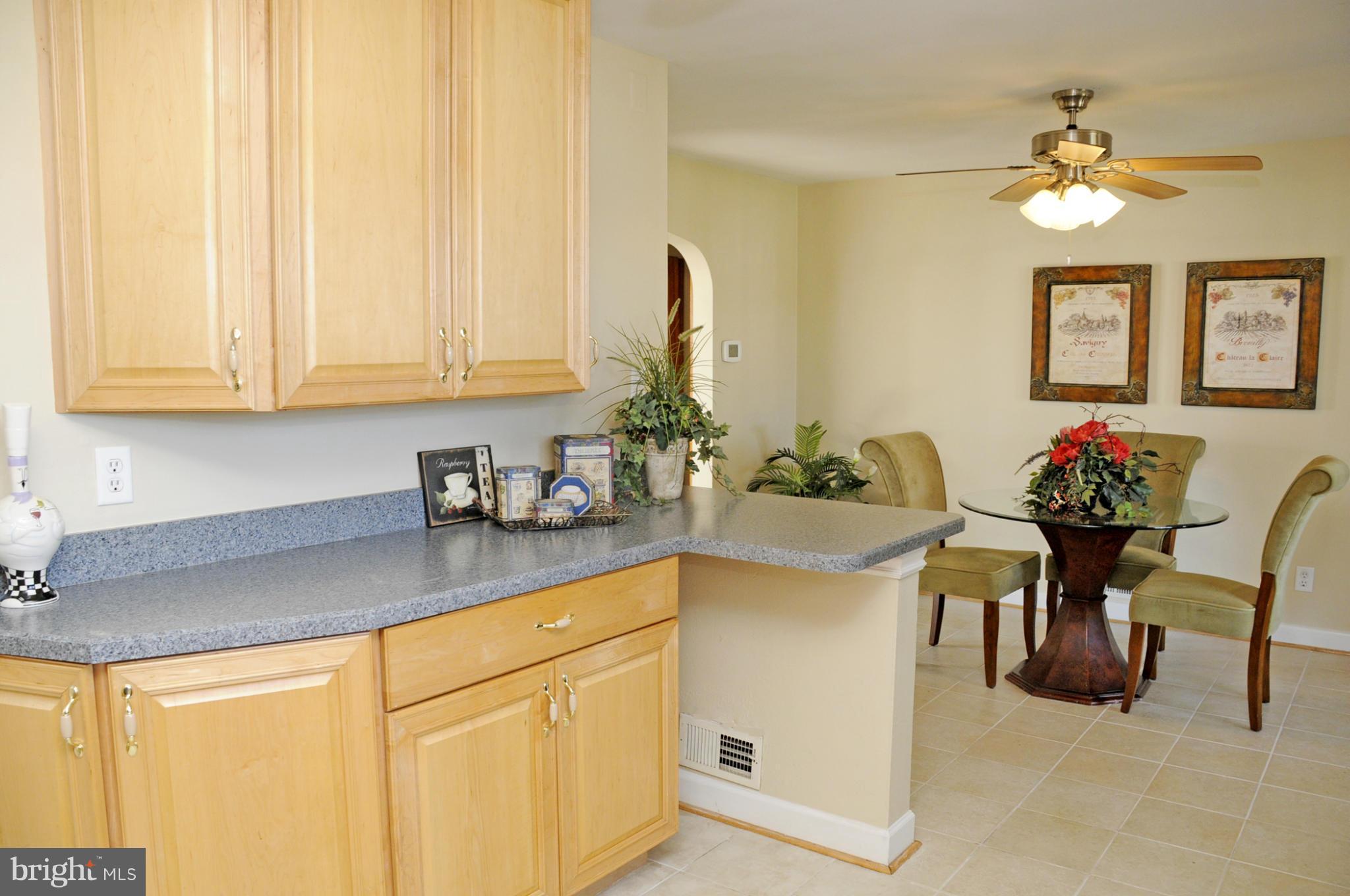 606 Cleveland Road Linthicum Heights, MD 21090 - Photo 8 of 24 a kitchen with a sink and cabinets