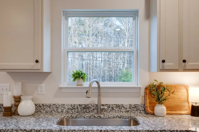 a vase of flowers sitting on a table