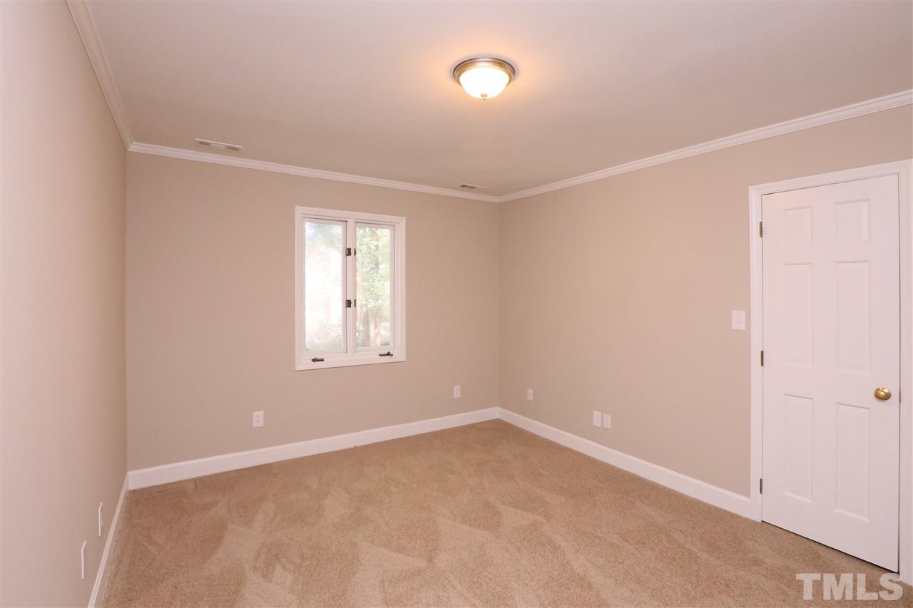 3109 Rutledge Court Raleigh, NC 27613 - Photo 12 of 25 an empty room with a window