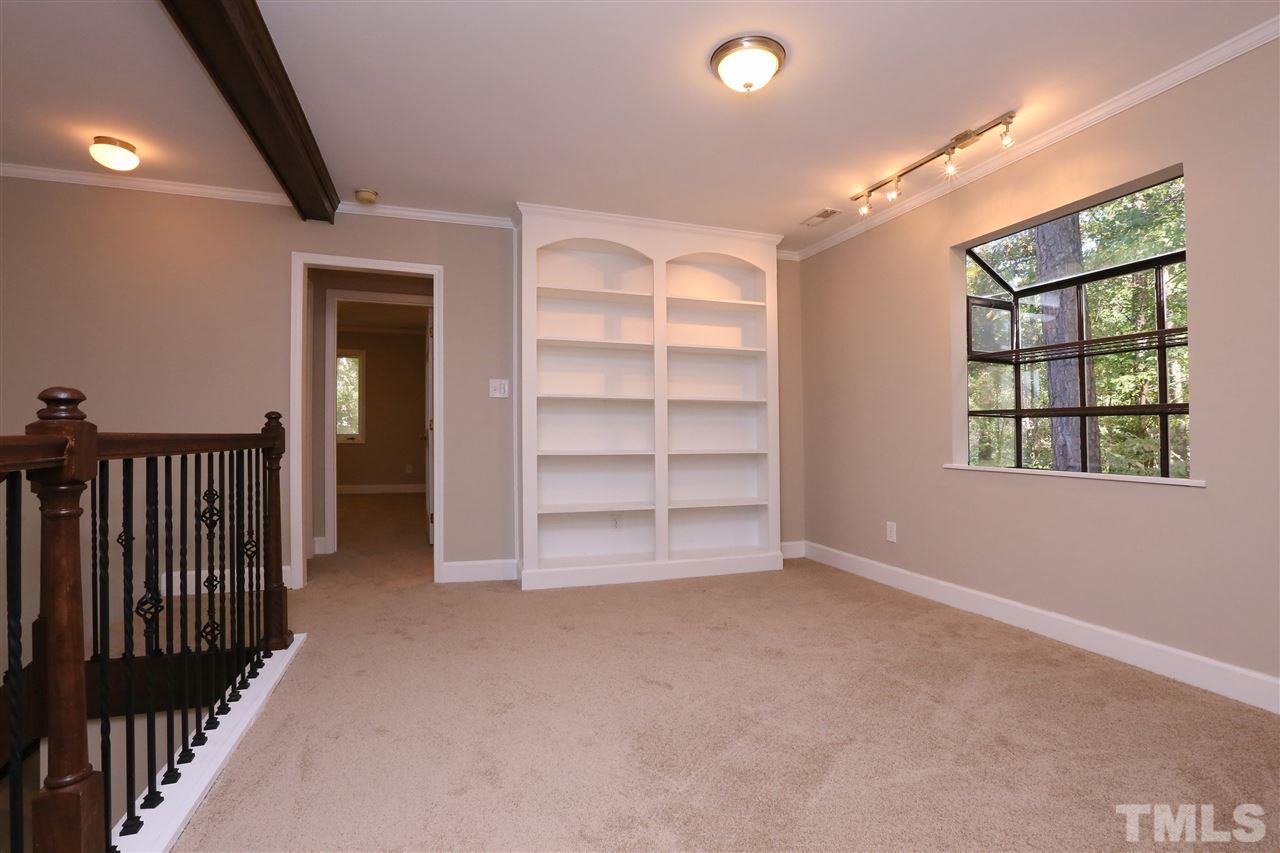 3109 Rutledge Court Raleigh, NC 27613 - Photo 17 of 25 a view of an empty room with a window