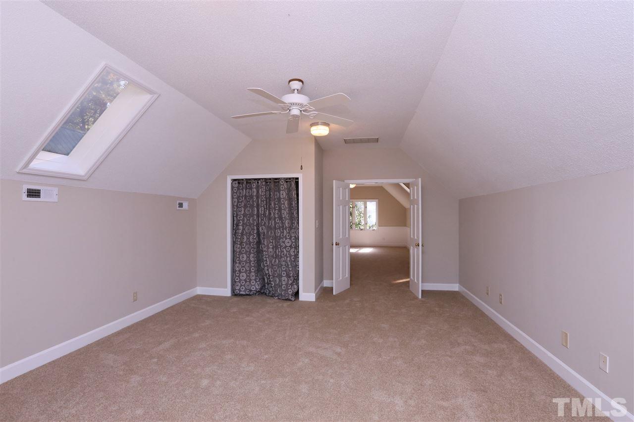 3109 Rutledge Court Raleigh, NC 27613 - Photo 20 of 25 a view of an empty room with a window