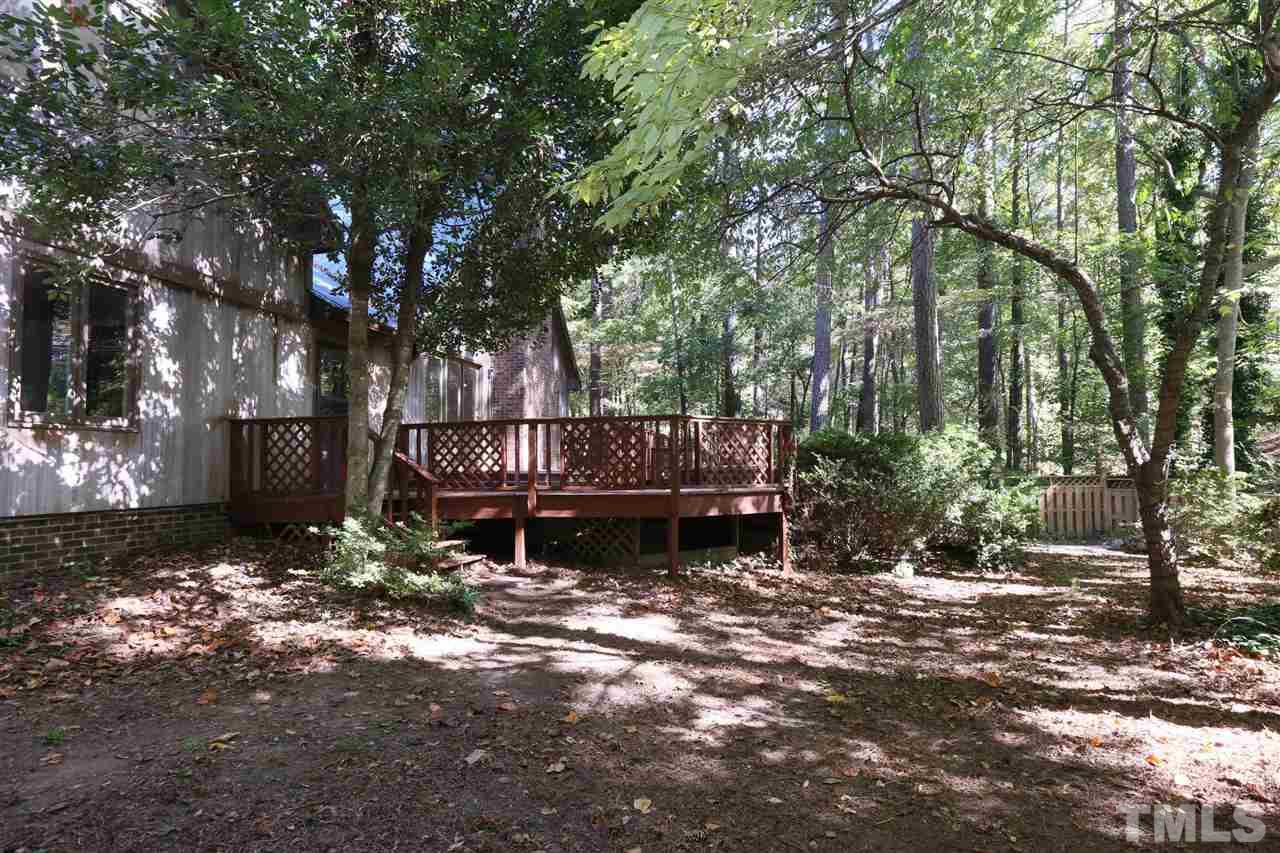 3109 Rutledge Court Raleigh, NC 27613 - Photo 25 of 25 a view of a bench in a yard