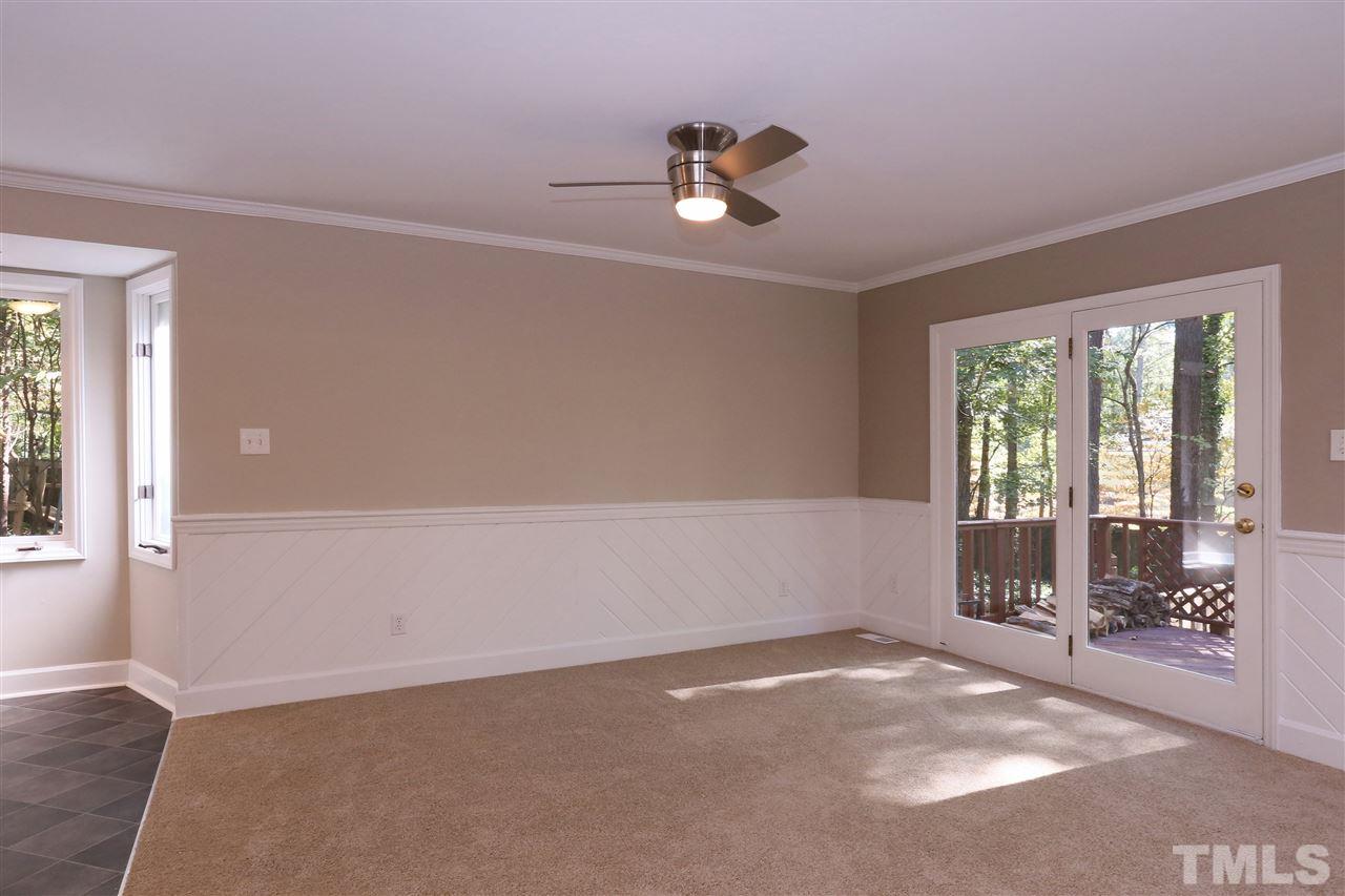 3109 Rutledge Court Raleigh, NC 27613 - Photo 6 of 25 a view of an empty room with a window