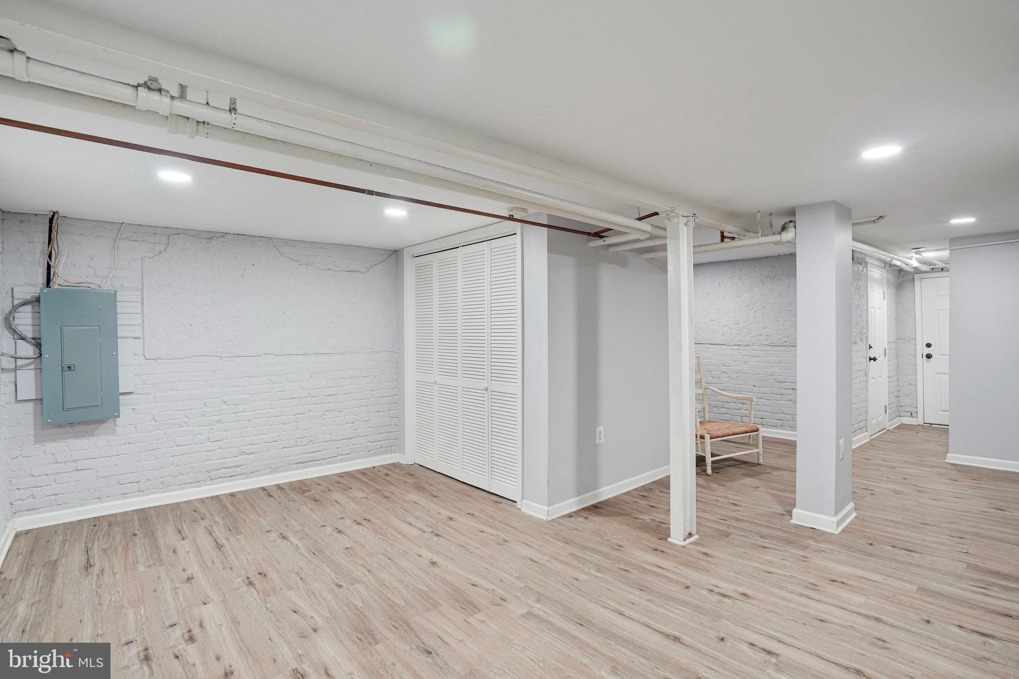 1273 Holbrook Terrace Northeast Washington, DC 20002 - Photo 20 of 24 a view of empty room with wooden floor and window