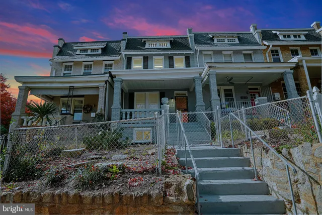 a view of a building with a porch