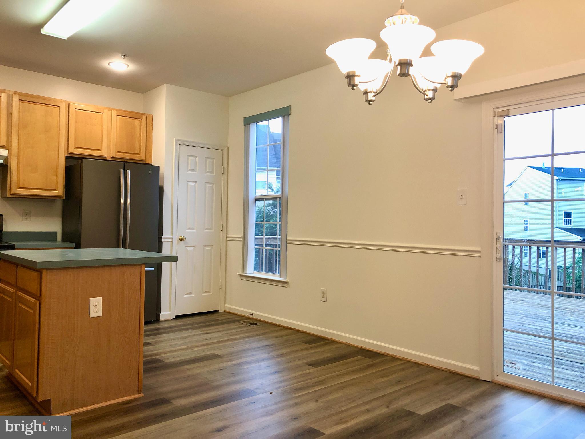 5377 Partners Court Frederick, MD 21703 - Photo 11 of 40 Nice kitchen & dining area w/sliding door to deck