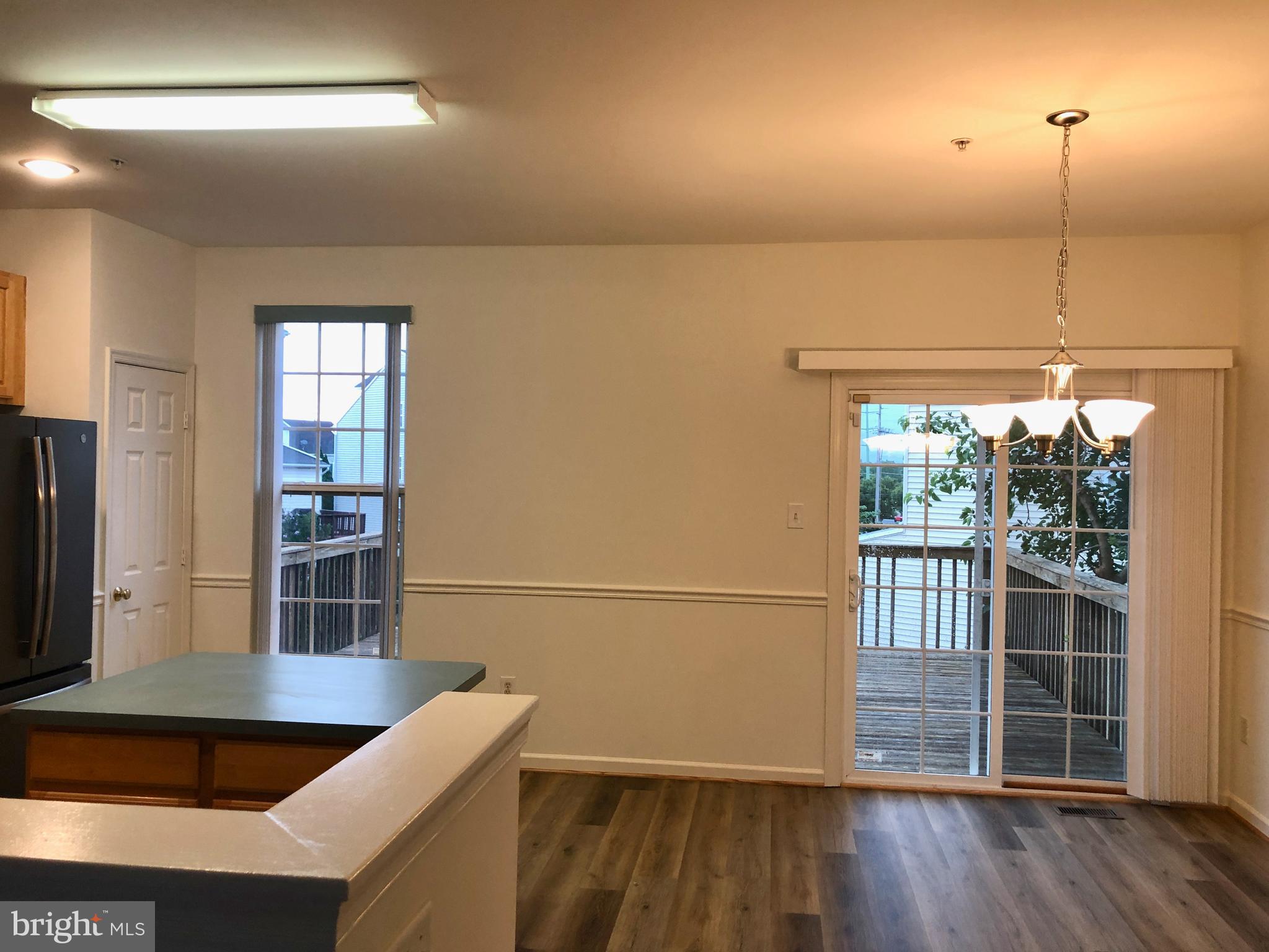5377 Partners Court Frederick, MD 21703 - Photo 14 of 40 Dining area with leading door to nice deck