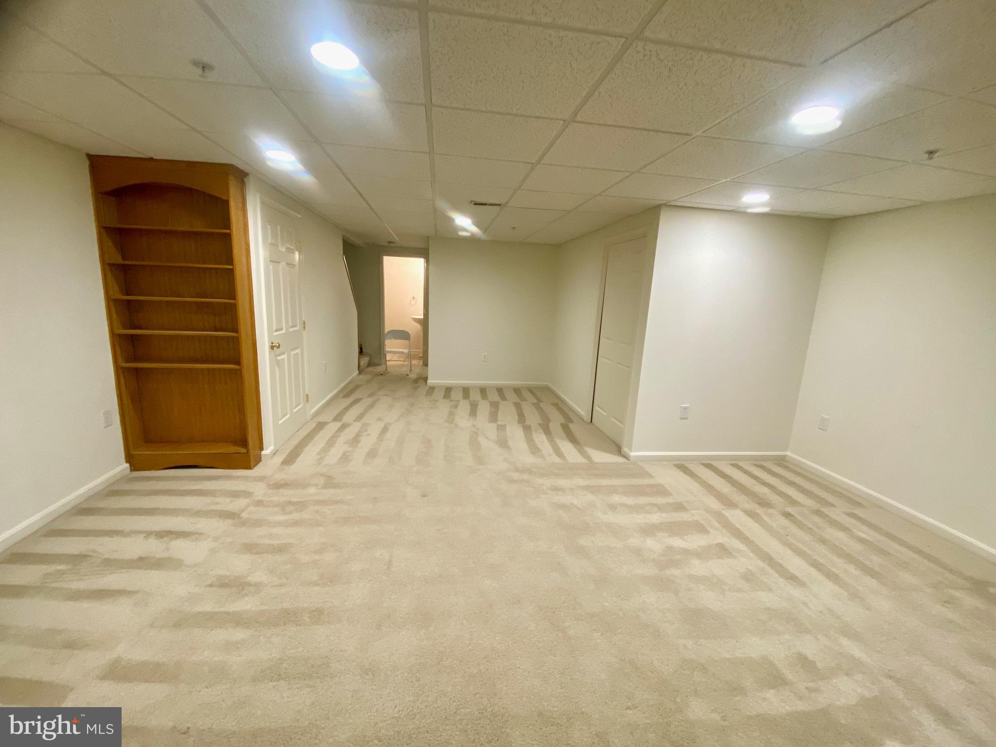 5377 Partners Court Frederick, MD 21703 - Photo 39 of 40 Nice spacious basement with built-in bookcase