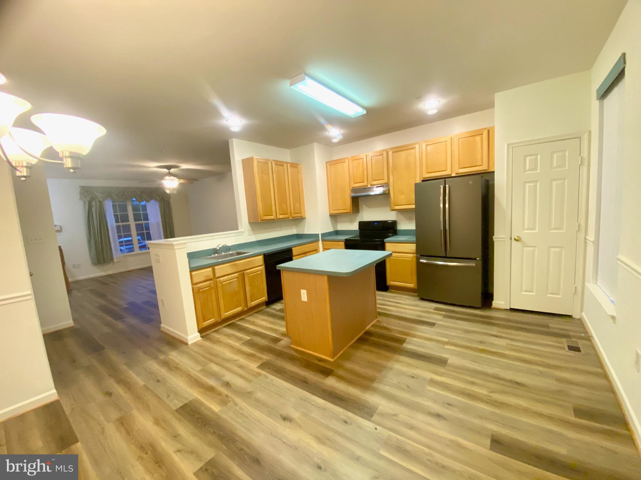 5377 Partners Court Frederick, MD 21703 - Photo 7 of 40 Living room and kitchen/dining area