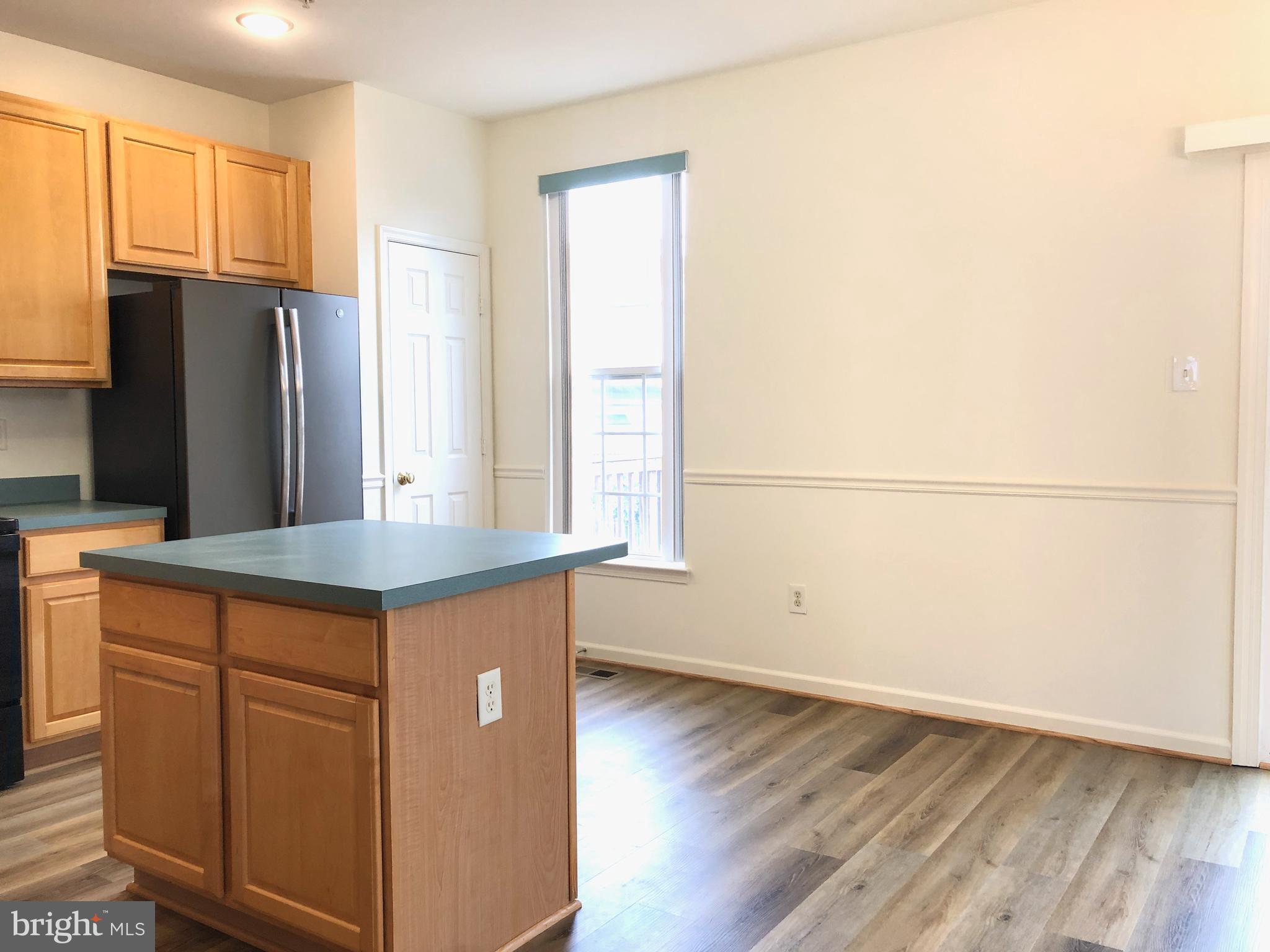 5377 Partners Court Frederick, MD 21703 - Photo 9 of 40 Bright and sunny kitchen with center isle