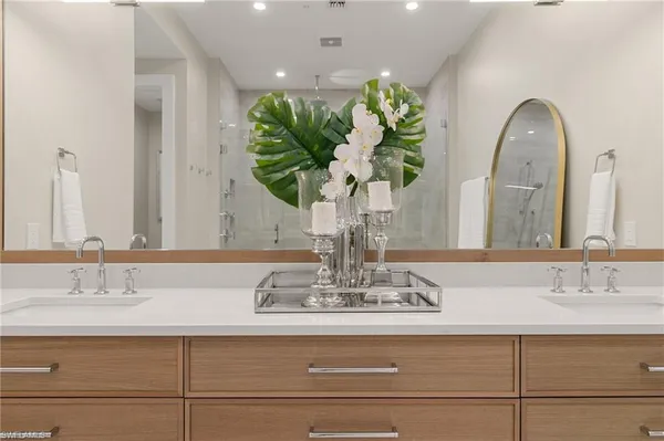 a bathroom with a bathtub and a shower