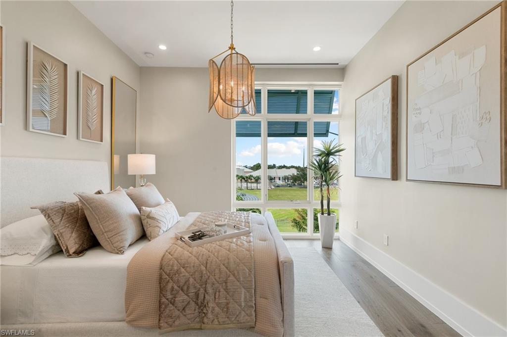 201 8th Street South, Unit 301 Naples, FL 34102 - Photo 20 of 43 a living room with furniture