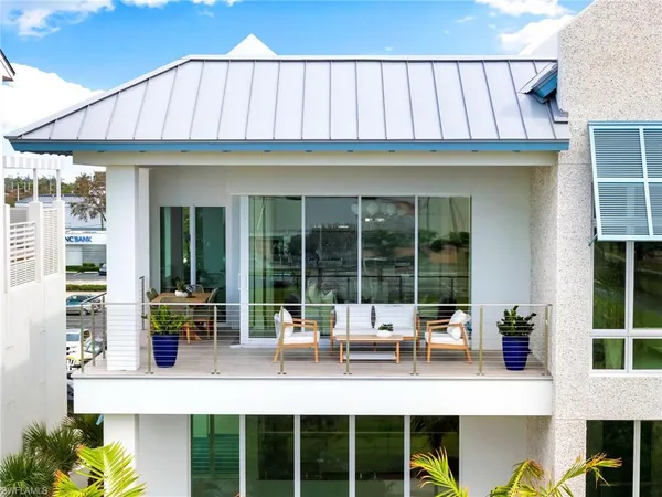 a view of a building with a yard