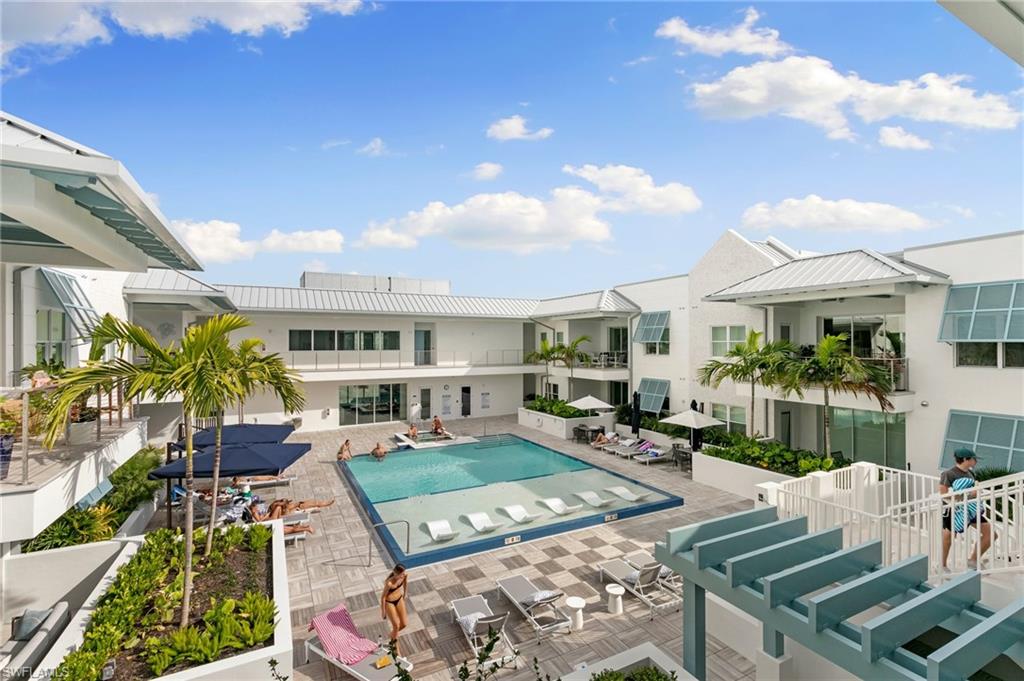 201 8th Street South, Unit 301 Naples, FL 34102 - Photo 34 of 43 a living room with furniture