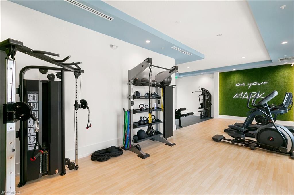 201 8th Street South, Unit 301 Naples, FL 34102 - Photo 35 of 43 a view of a room with gym equipment