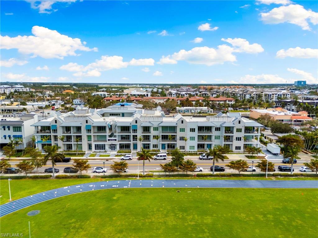201 8th Street South, Unit 301 Naples, FL 34102 - Photo 43 of 43 a view of a swimming pool and lake view