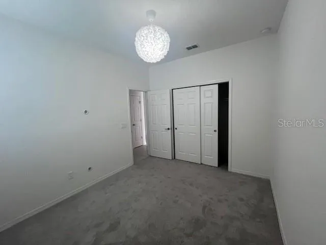 en empty room with fan