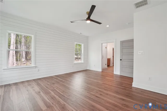 a kitchen with a sink and a refrigerator