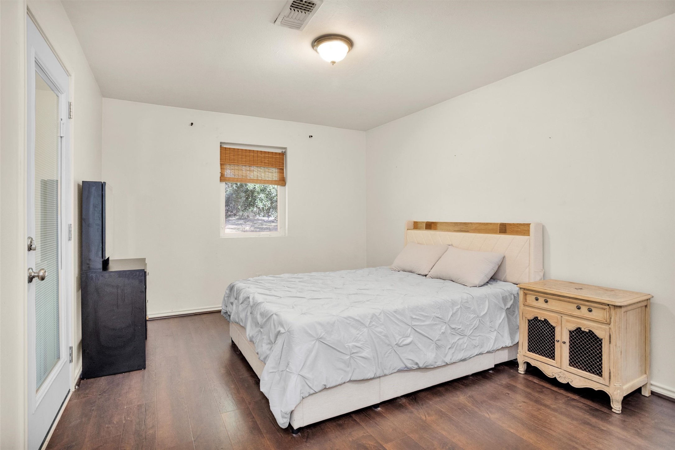 40610 Mill Creek Road Magnolia, TX 77354 - Photo 18 of 31 Bedroom 4 This has a exit door to the patio. It can be used as a study or a flex room