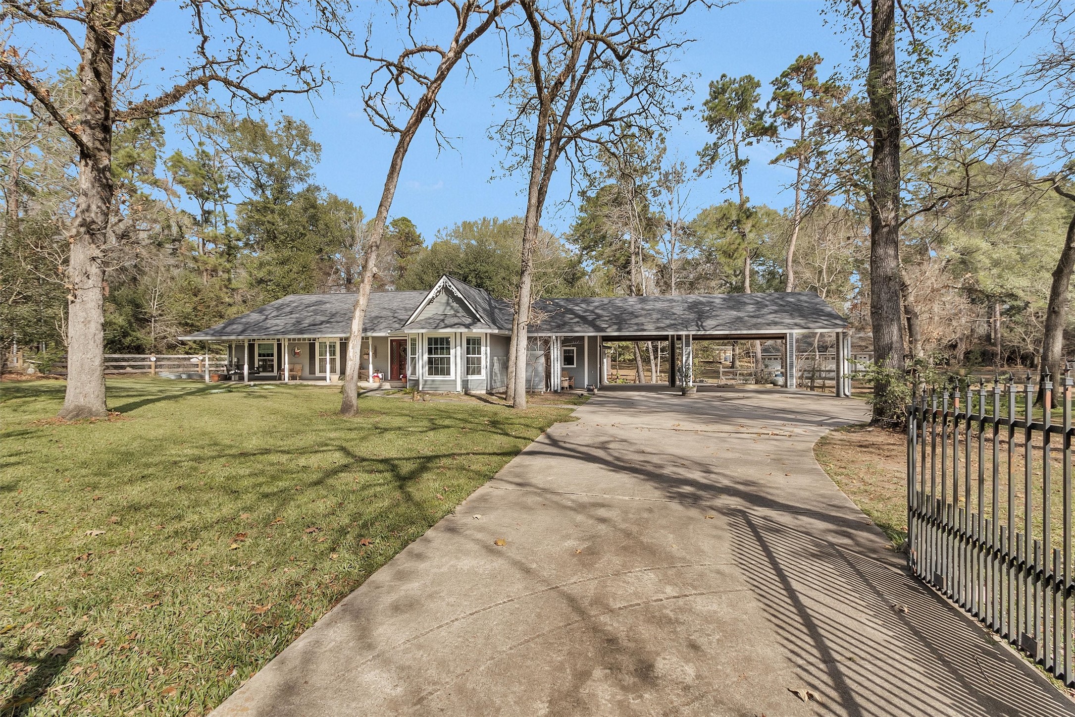 40610 Mill Creek Road Magnolia, TX 77354 - Photo 3 of 31 Electric gate leading to your private oasis