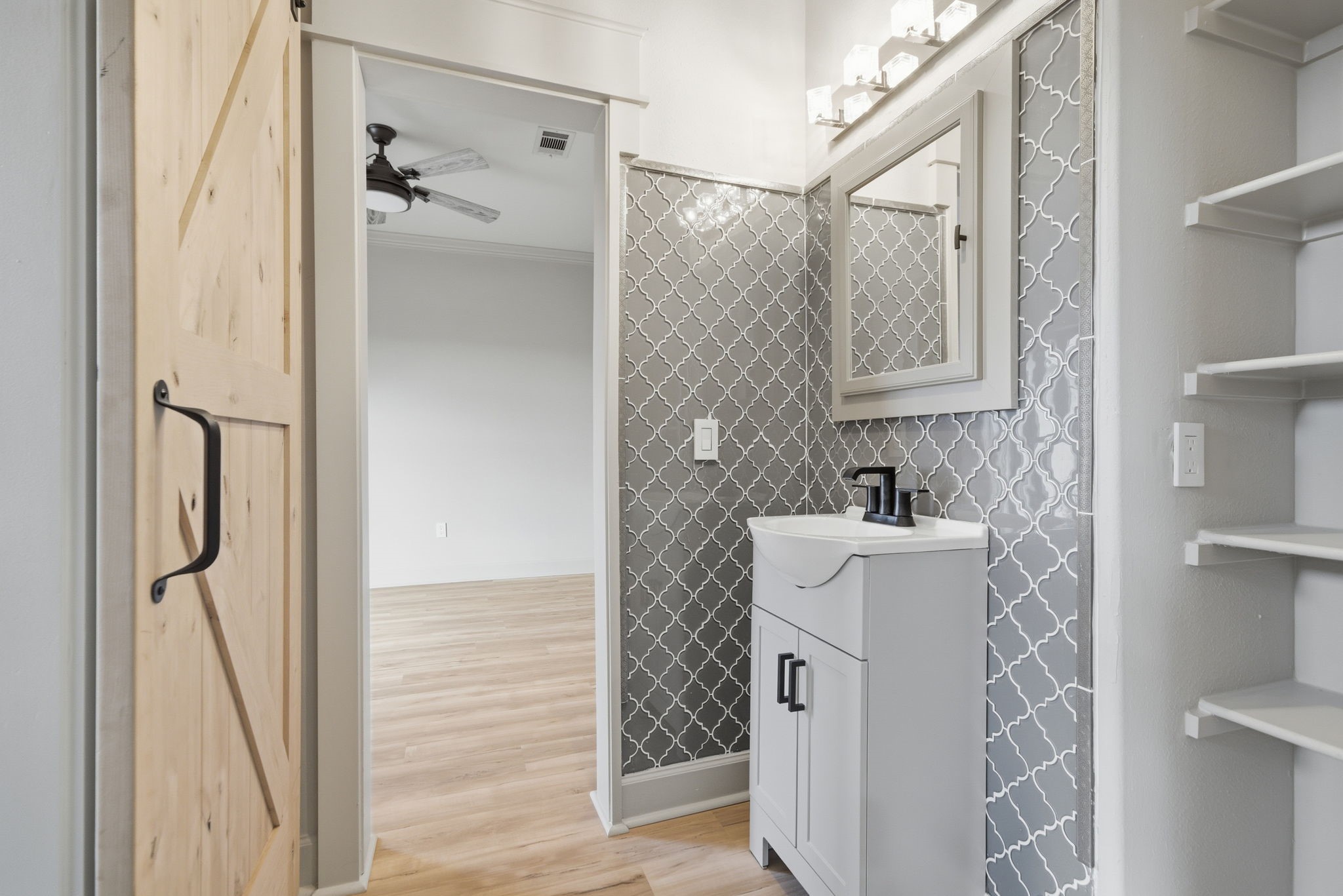 1918 Todville Road Seabrook, TX 77586 - Photo 24 of 41 Stylish third-level full bath conveniently positioned between the two guest bedrooms for easy access and privacy.