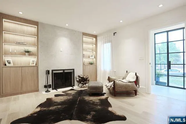 a living room with furniture and a rug