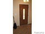 42335 Park Ridge Road Novi, MI 48375 - Photo 2 of 17 Foyer with pretty door!!