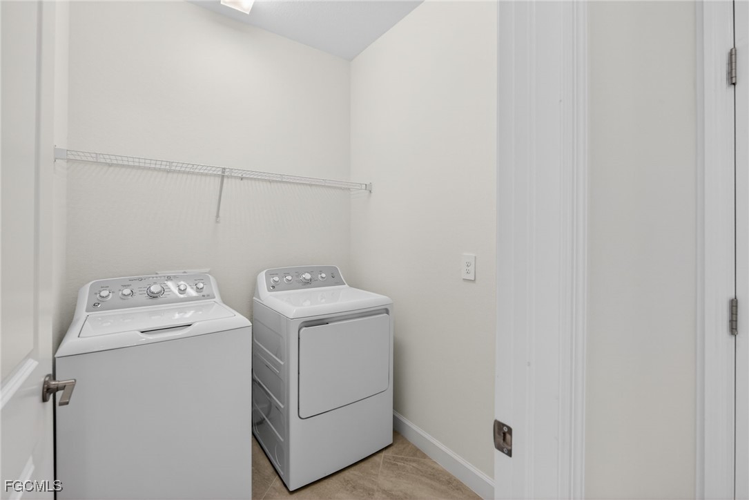 17364 Walnut Run Drive Alva, FL 33920 - Photo 21 of 50 a utility room with dryer and washer