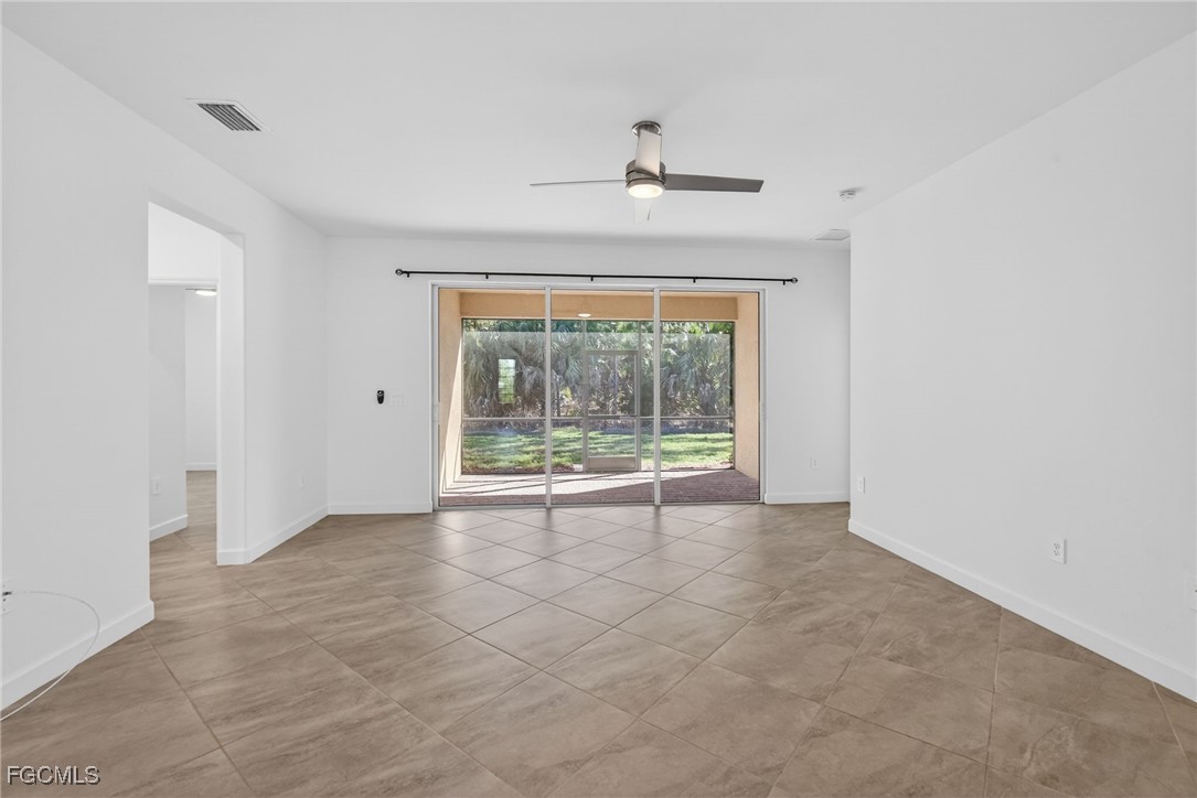 17364 Walnut Run Drive Alva, FL 33920 - Photo 28 of 50 a view of an empty room with a window