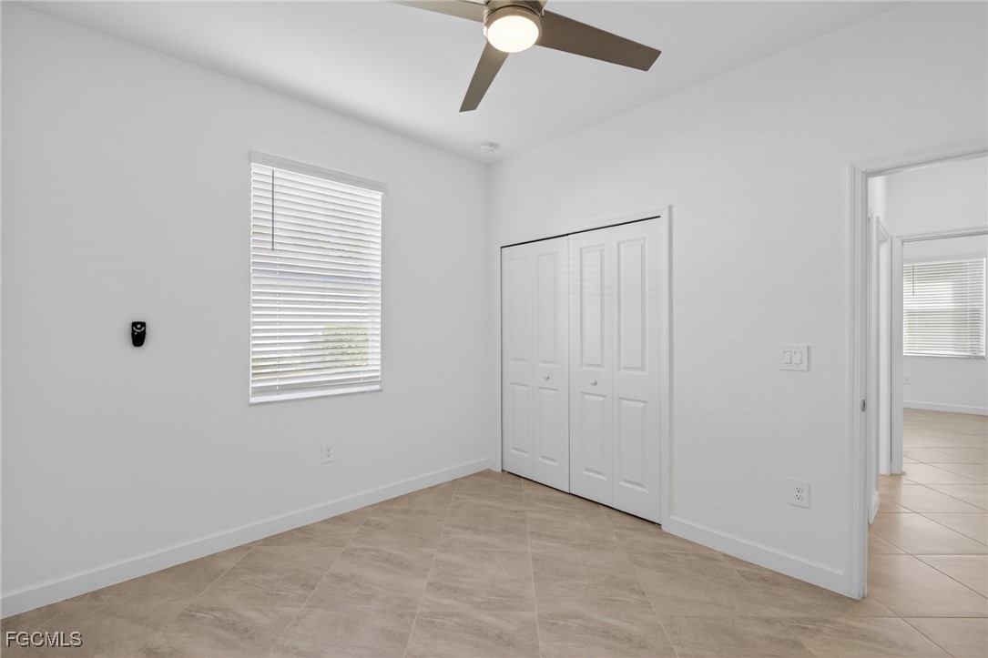 17364 Walnut Run Drive Alva, FL 33920 - Photo 33 of 50 a view of an empty room with a window