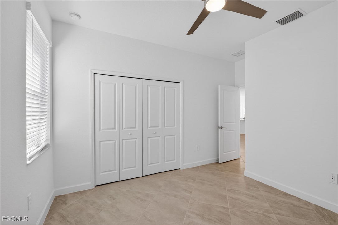 17364 Walnut Run Drive Alva, FL 33920 - Photo 34 of 50 a view of an empty room with a window