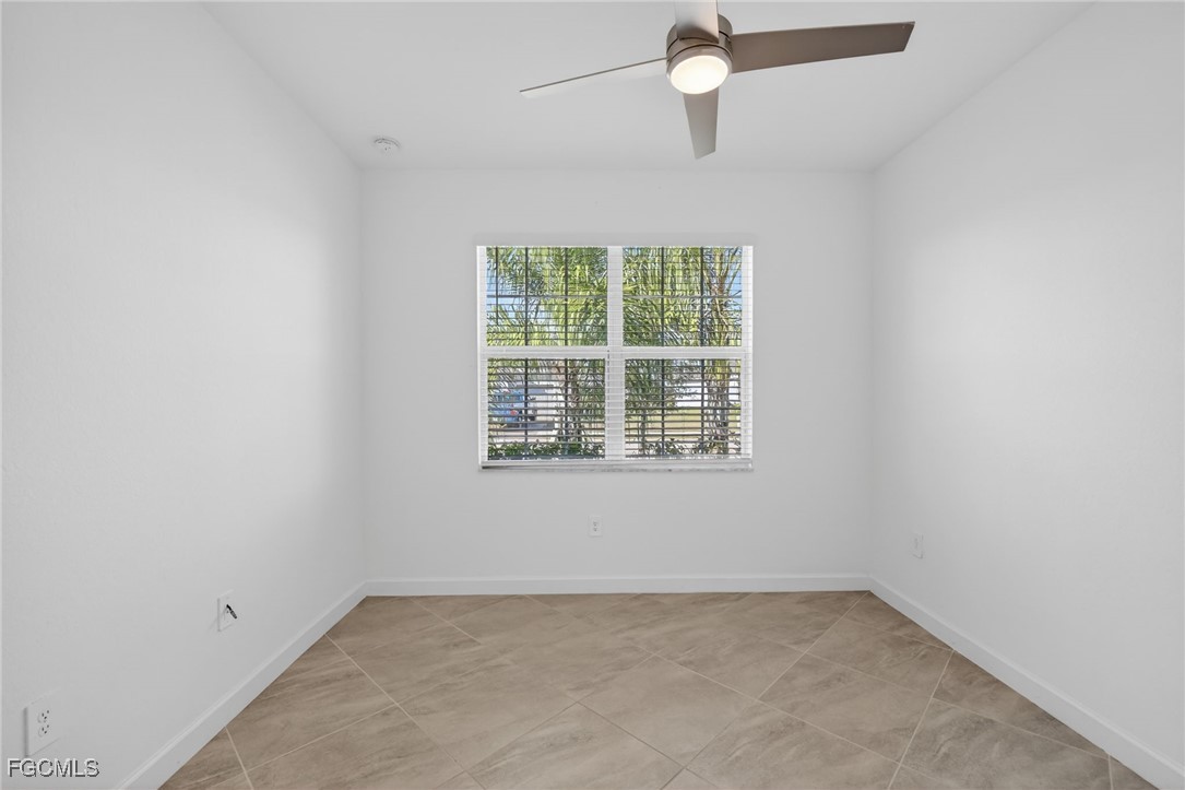 17364 Walnut Run Drive Alva, FL 33920 - Photo 42 of 50 an empty room with a window