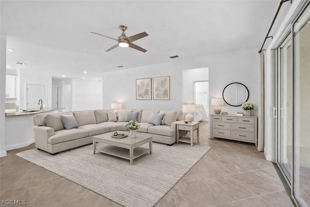 17364 Walnut Run Drive Alva, FL 33920 - Photo 5 of 50 a living room with furniture and a window