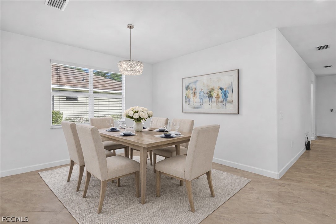 17364 Walnut Run Drive Alva, FL 33920 - Photo 6 of 50 a view of a dining room with furniture window and outside view