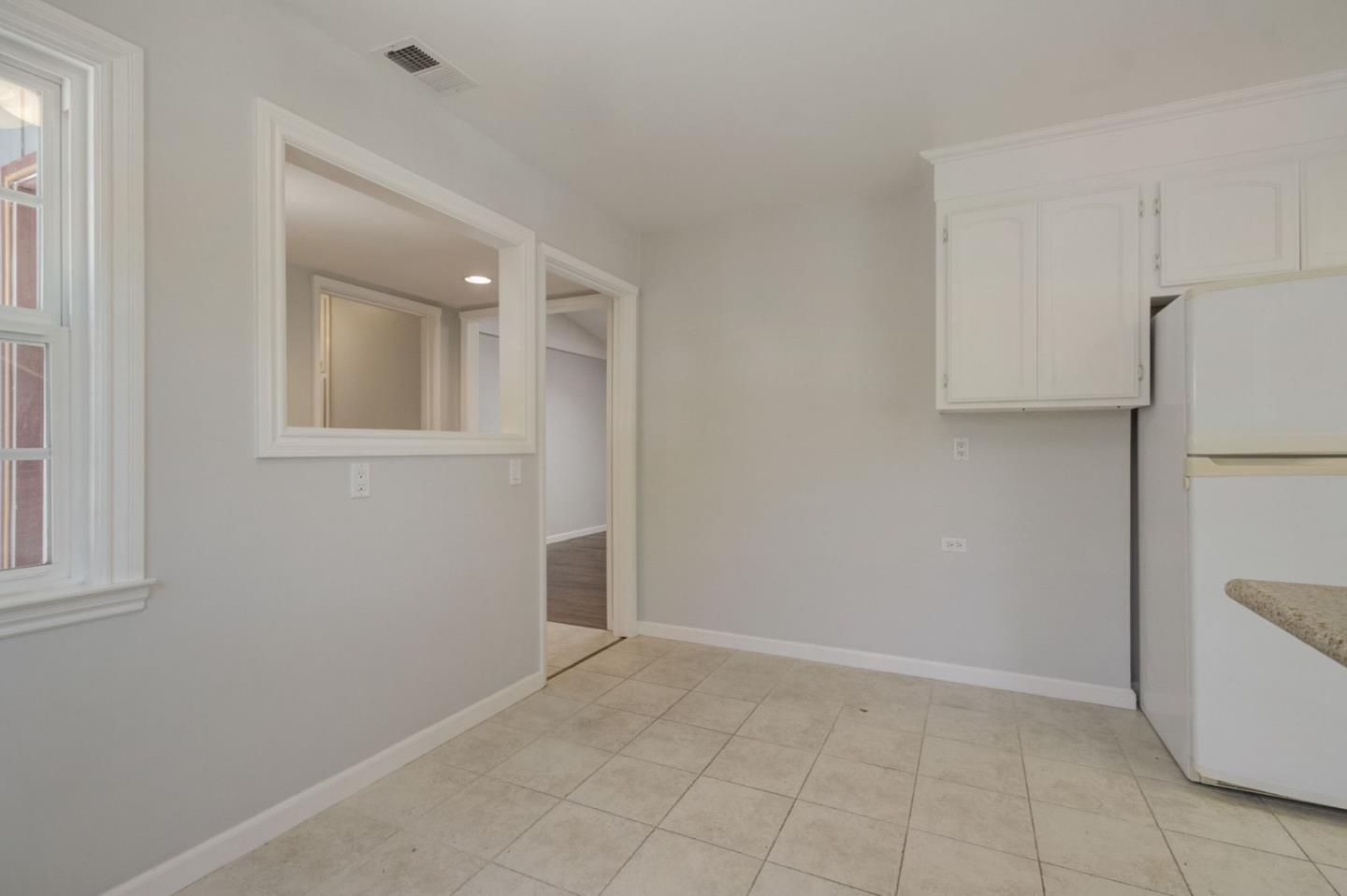 613 North Central Avenue Campbell, CA 95008 - Photo 12 of 66 a view of an empty room with a window