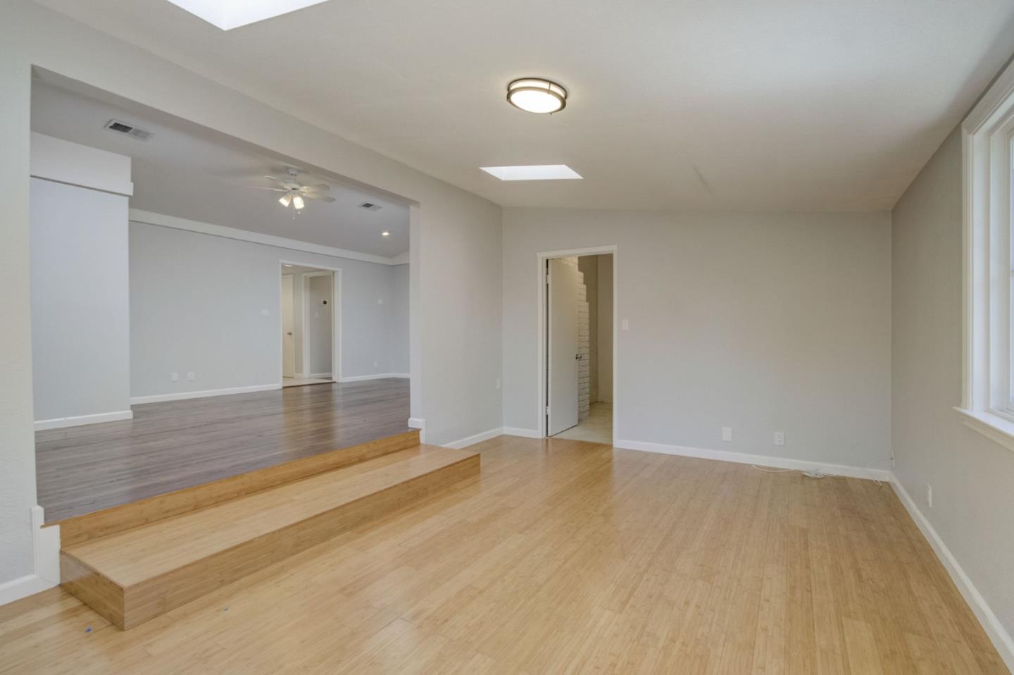 613 North Central Avenue Campbell, CA 95008 - Photo 23 of 66 a view of an empty room with wooden floor and a window