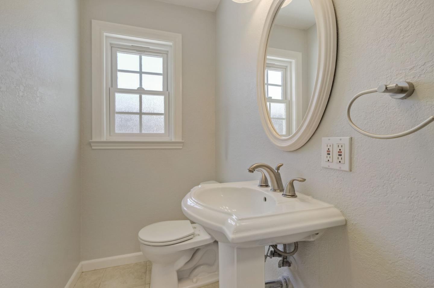 613 North Central Avenue Campbell, CA 95008 - Photo 28 of 66 a bathroom with a toilet sink and mirror