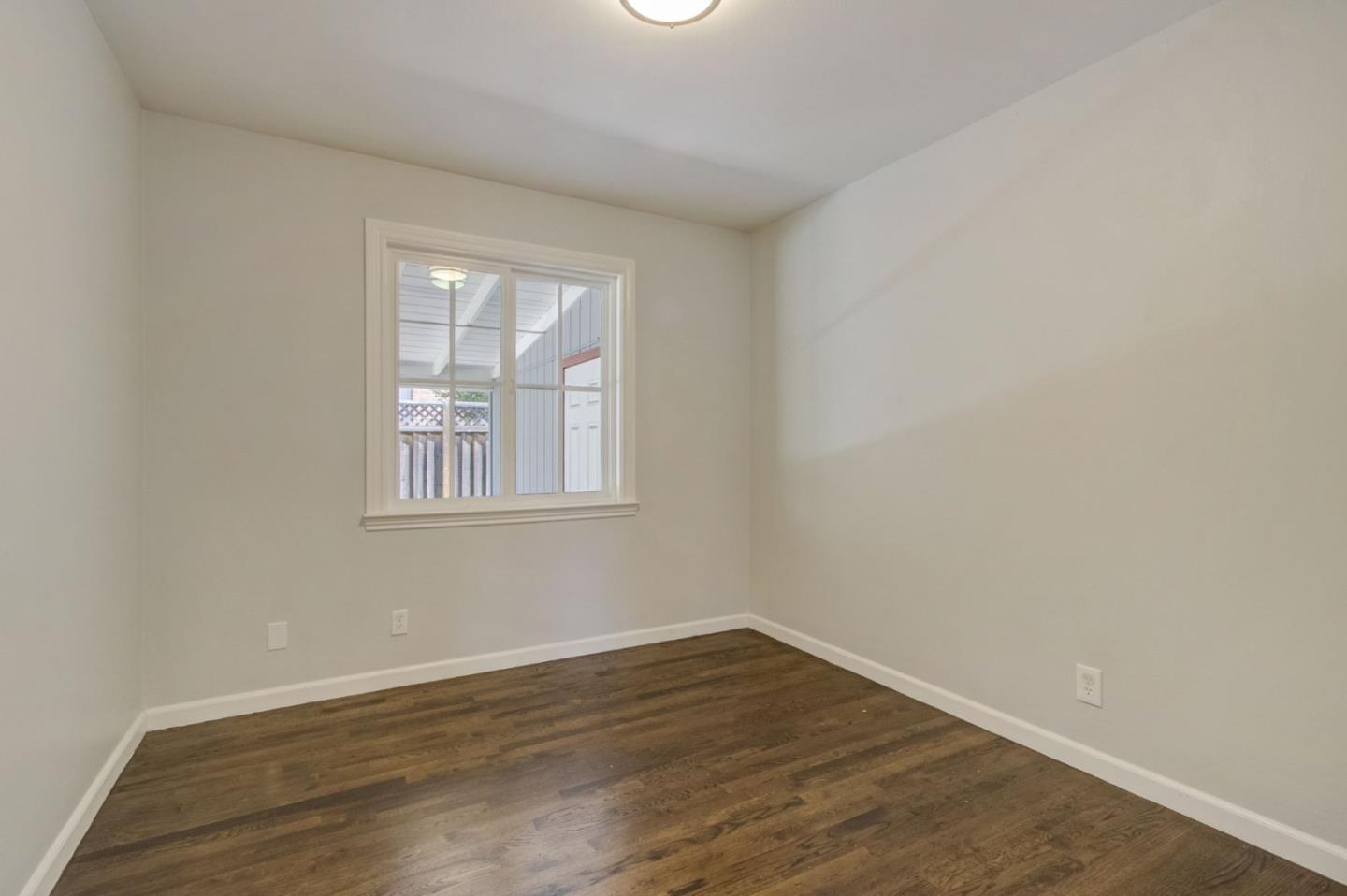 613 North Central Avenue Campbell, CA 95008 - Photo 37 of 66 wooden floor in an empty room with a window