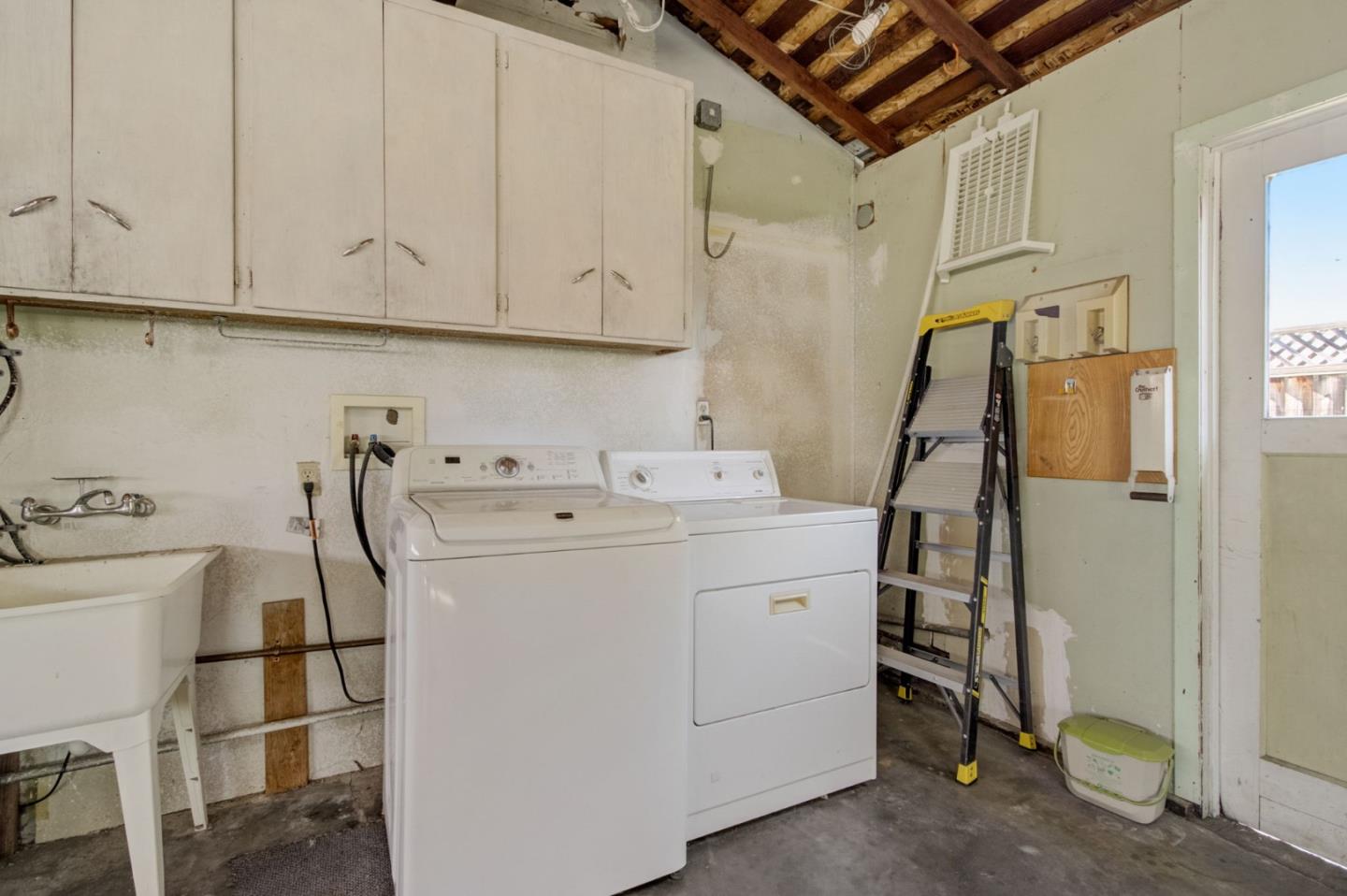 613 North Central Avenue Campbell, CA 95008 - Photo 41 of 66 a utility room with cabinets
