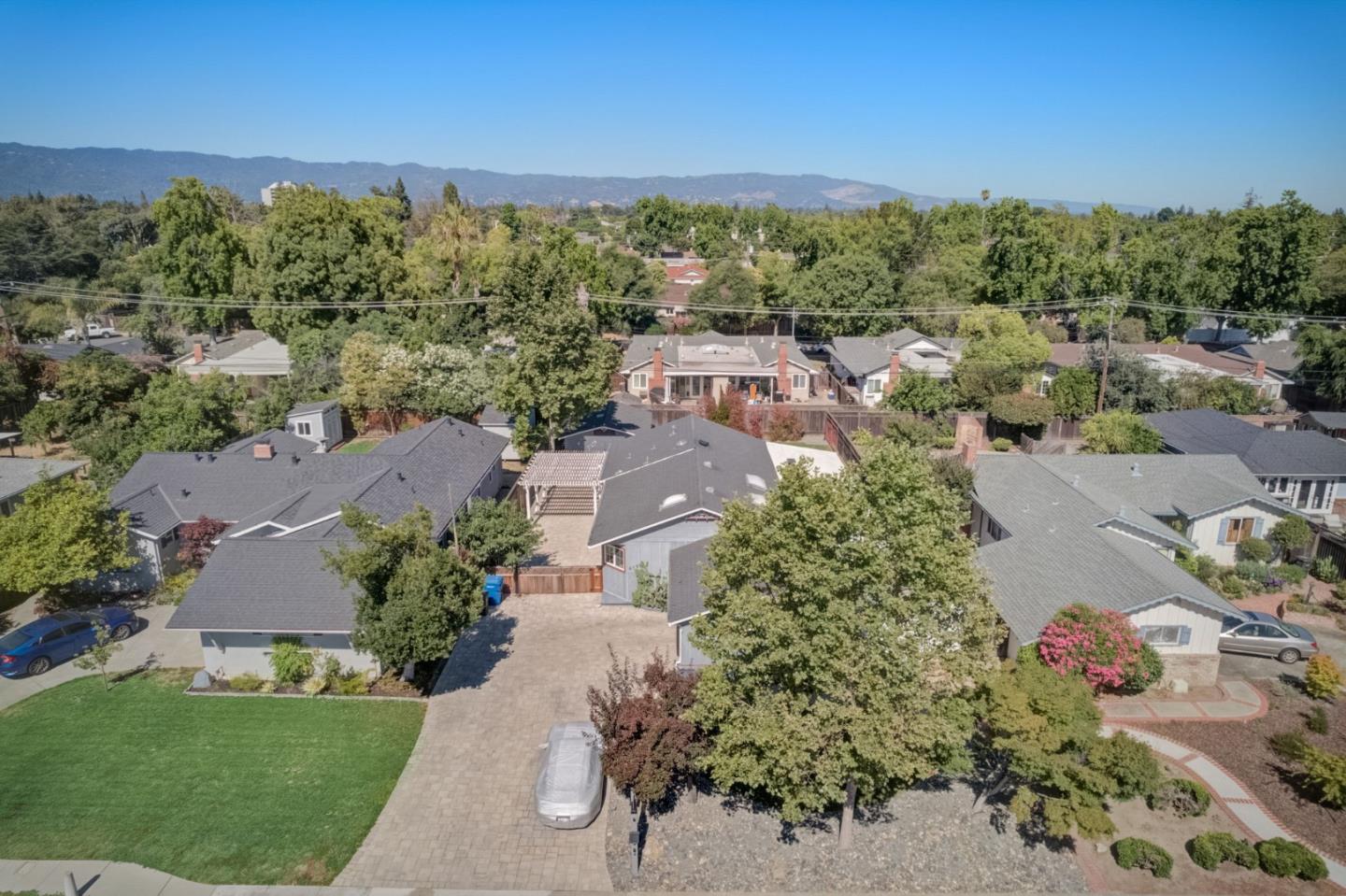 613 North Central Avenue Campbell, CA 95008 - Photo 54 of 66 an aerial view of a houses with a yard