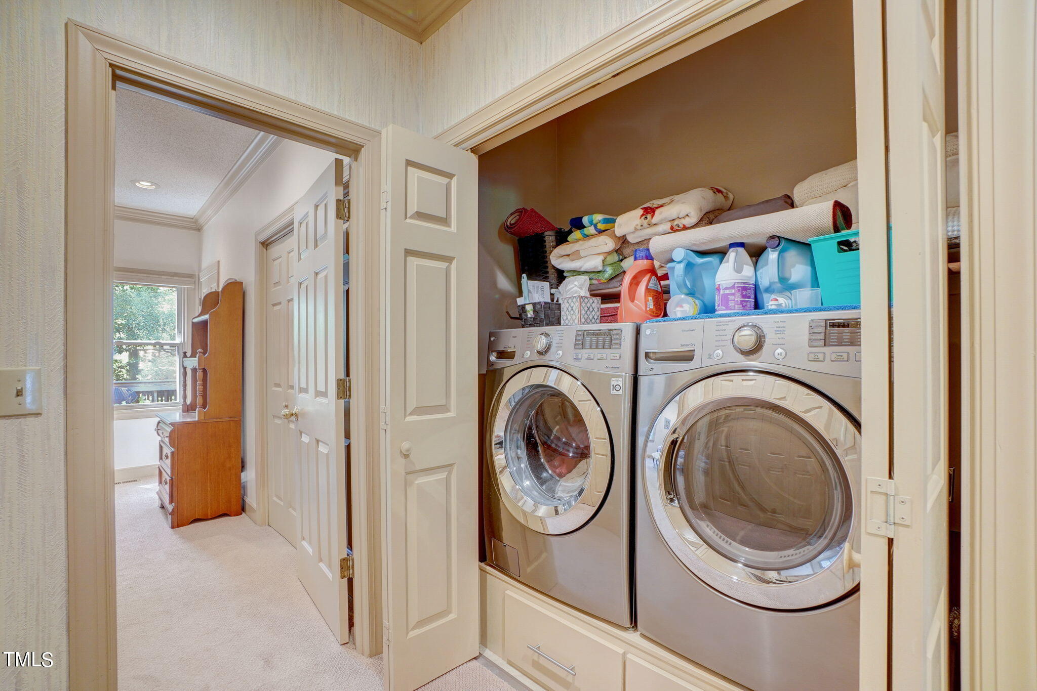 7931 Footman Way Raleigh, NC 27615 - Photo 21 of 33 a utility room with dryer and washer