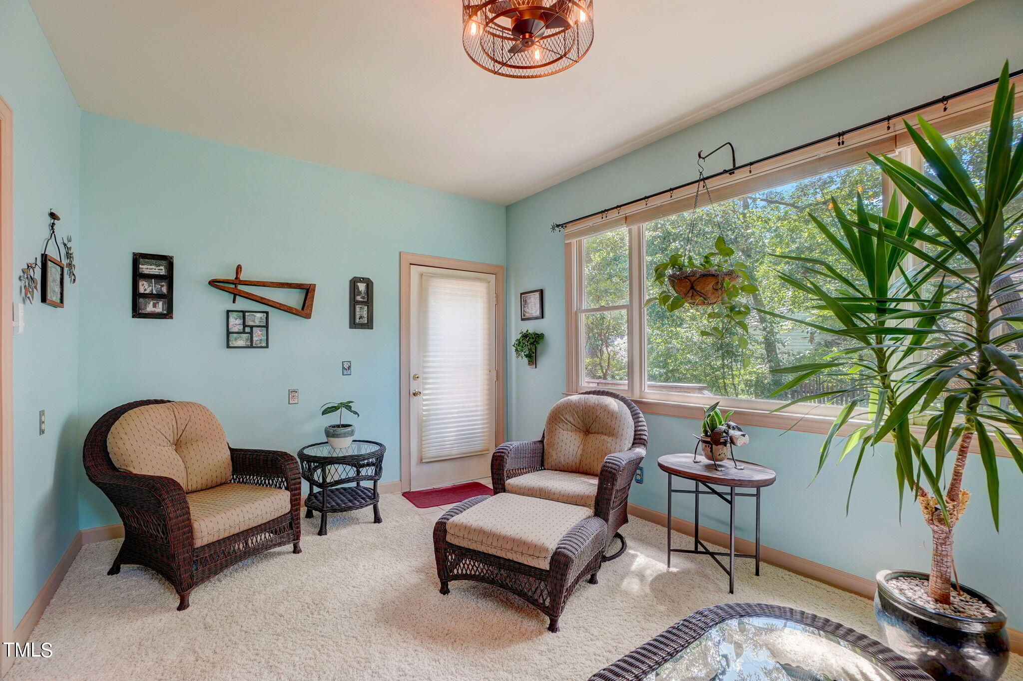 7931 Footman Way Raleigh, NC 27615 - Photo 29 of 33 a living room with furniture and a large window