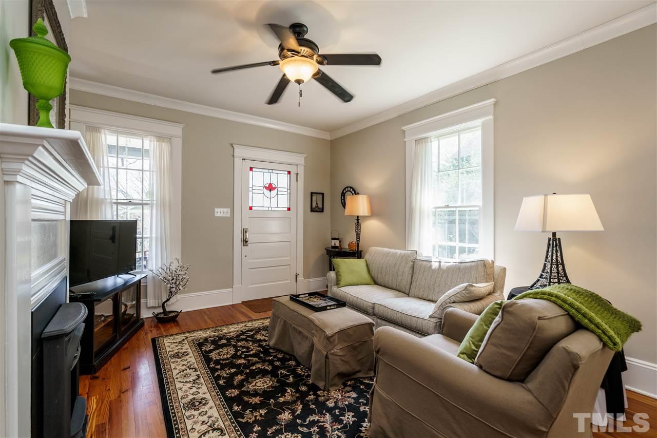 617 Elm Street Raleigh, NC 27604 - Photo 5 of 26 a living room with furniture and a flat screen tv