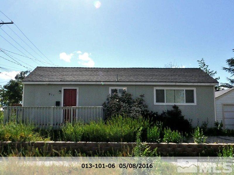 511 Locust Street Reno, NV 89502 - Photo 1 of 1 a front view of a house with a garden
