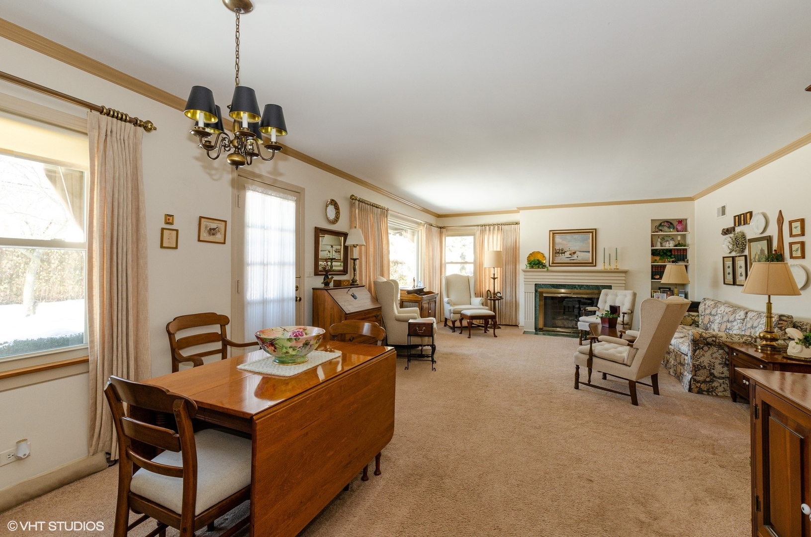830 Warrington Road Deerfield, IL 60015 - Photo 5 of 15 a living room with furniture a fireplace and a window
